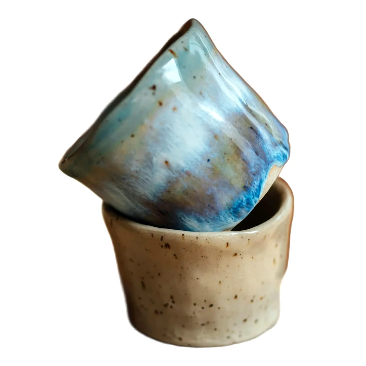 The same two ceramic cups cut out onto a plain white background, cropped square