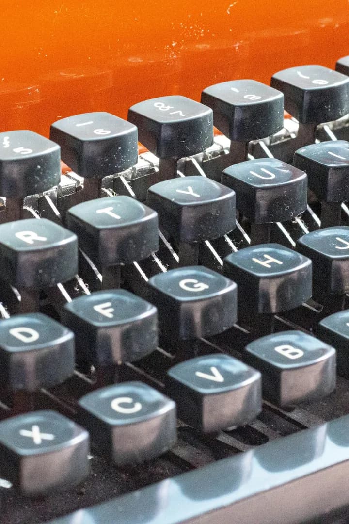 Close-up of the typewriter's dark grey keys