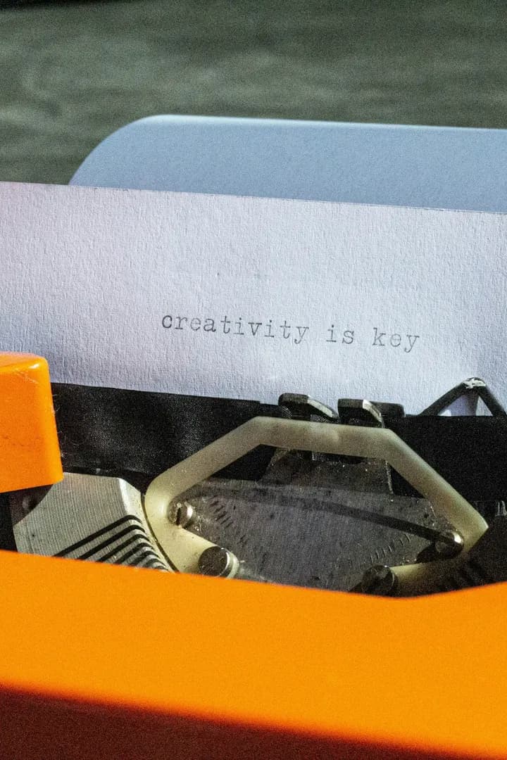 A sheet in the carriage with the line “creativity is key” typed on it